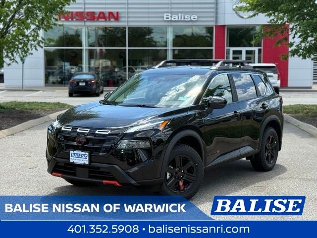 2026 Nissan Rogue Rock Creek in Super Black — front three-quarter view