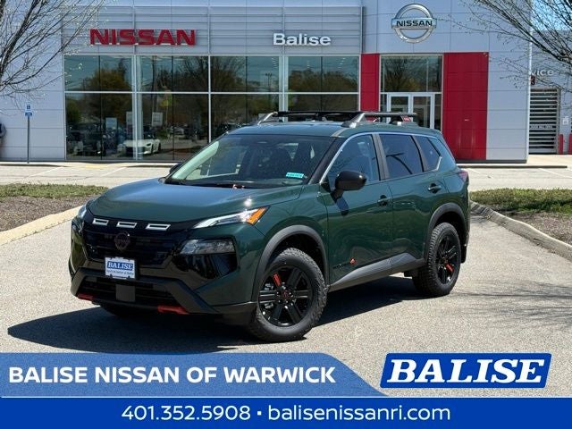 2026 Nissan Rogue Rock Creek in Obsidian Green — front three-quarter view