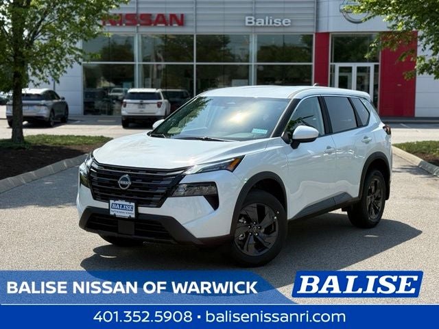 2026 Nissan Rogue SV in Everest White Pearl Tricoat — front three-quarter view